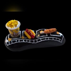 "AT THE MOVIES" HAND PAINTED ROCK WITH MINIATURE TRINKETS